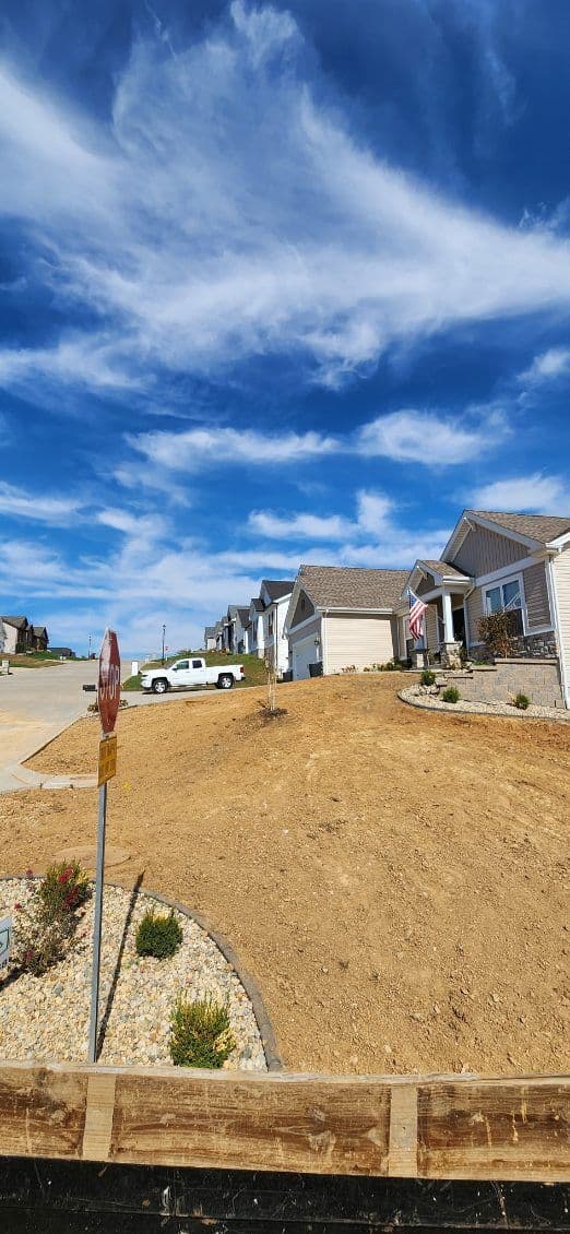 Gallery photos for Sloped Yard Transformation with New Sod Installation: Image #2