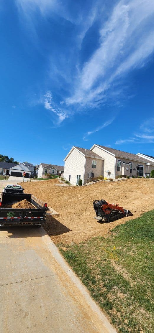 Gallery photos for Sloped Yard Transformation with New Sod Installation: Image #3
