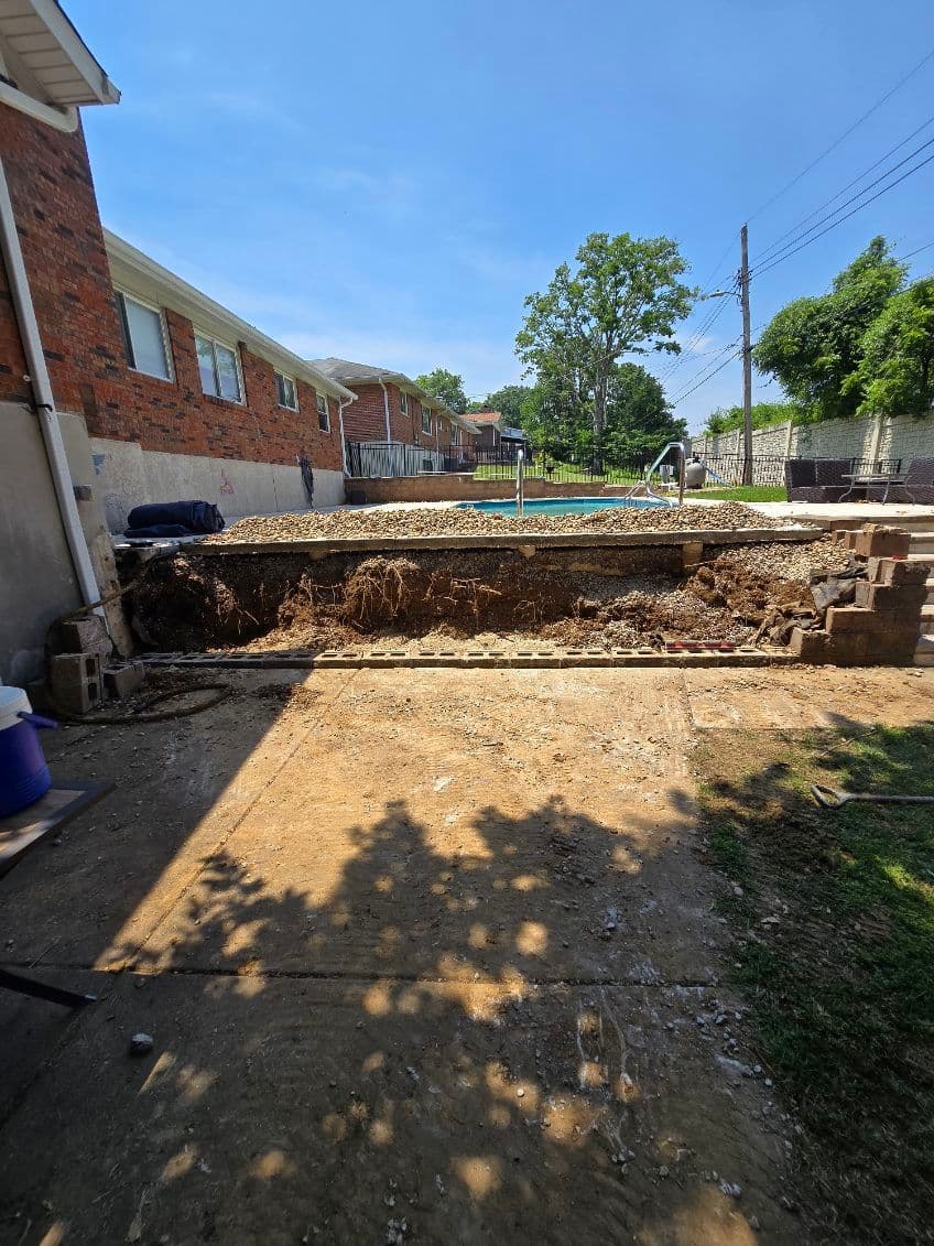 Gallery photos for Transformative Wall Rebuild with Expert Drainage: Image #1