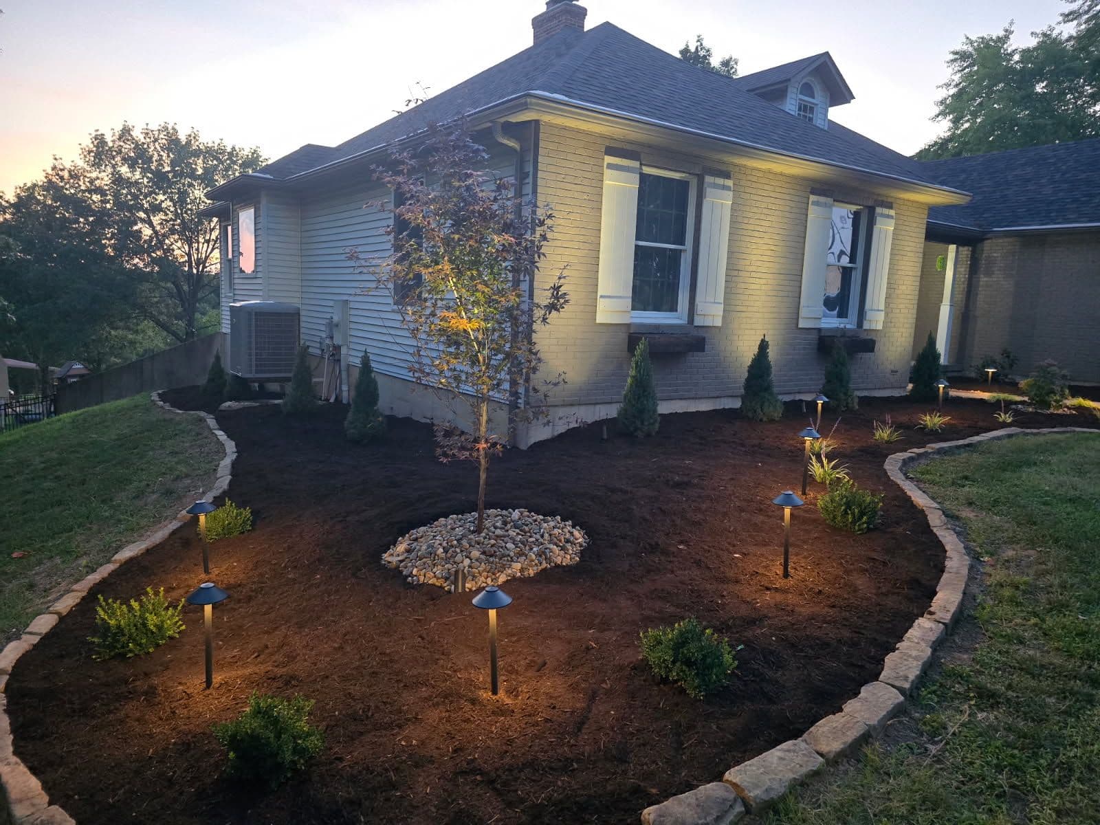 Elegant Landscape Transformation with Lighting image